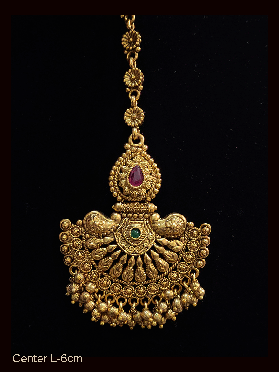 Half flower design maangtika with tear drop ruby stone on top