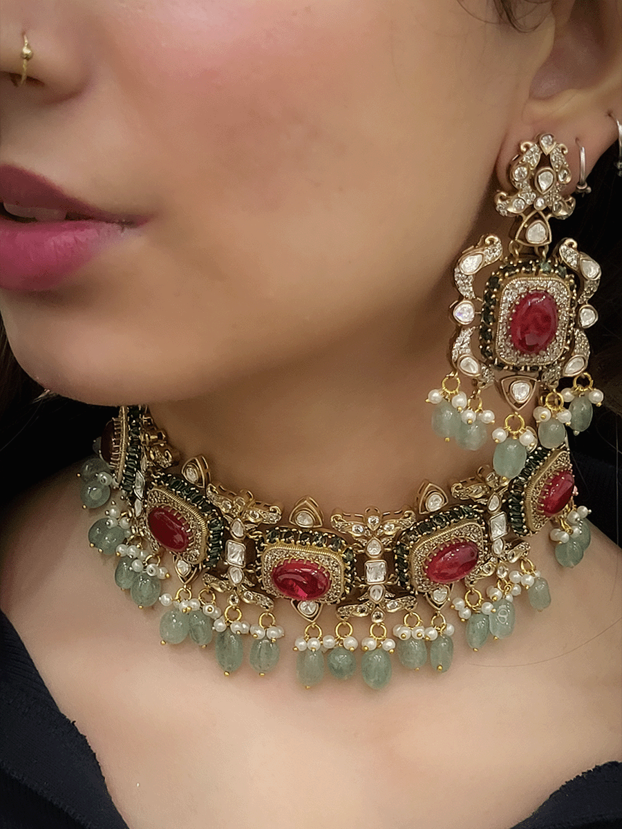 Kundan And zircon studded oval stone studies choker set with jade drops