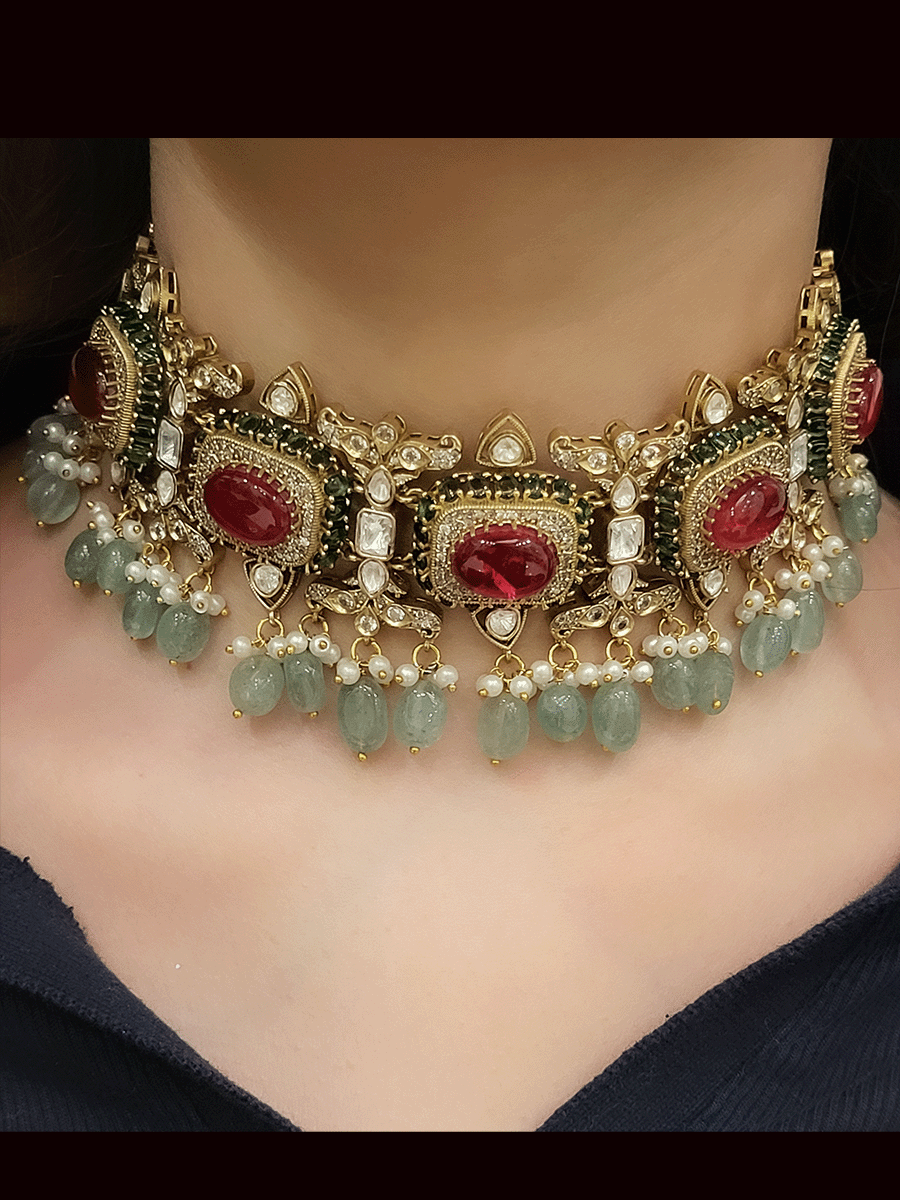 Kundan And zircon studded oval stone studies choker set with jade drops