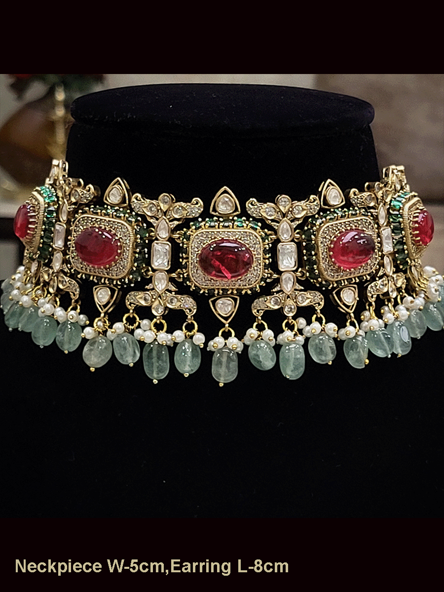 Kundan And zircon studded oval stone studies choker set with jade drops