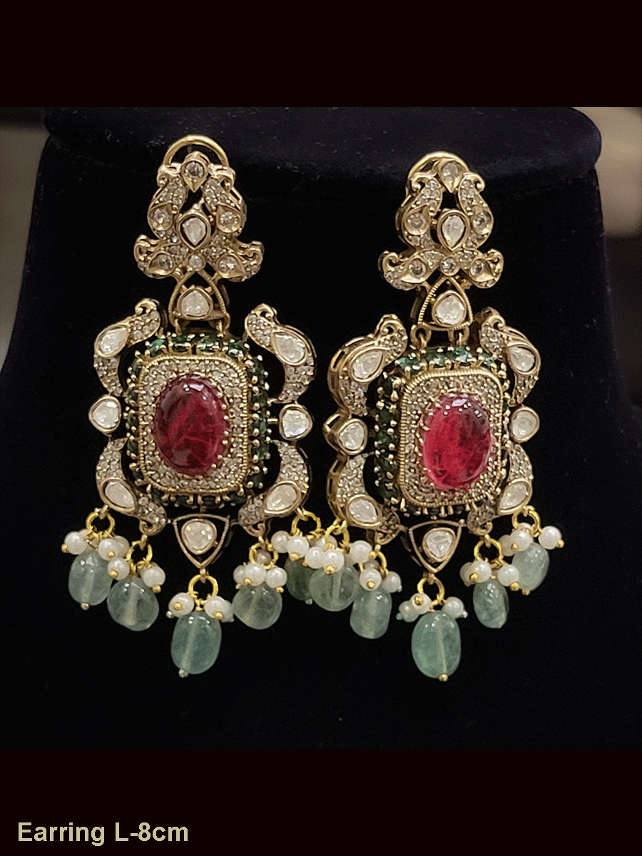 Kundan And zircon studded oval stone studies choker set with jade drops