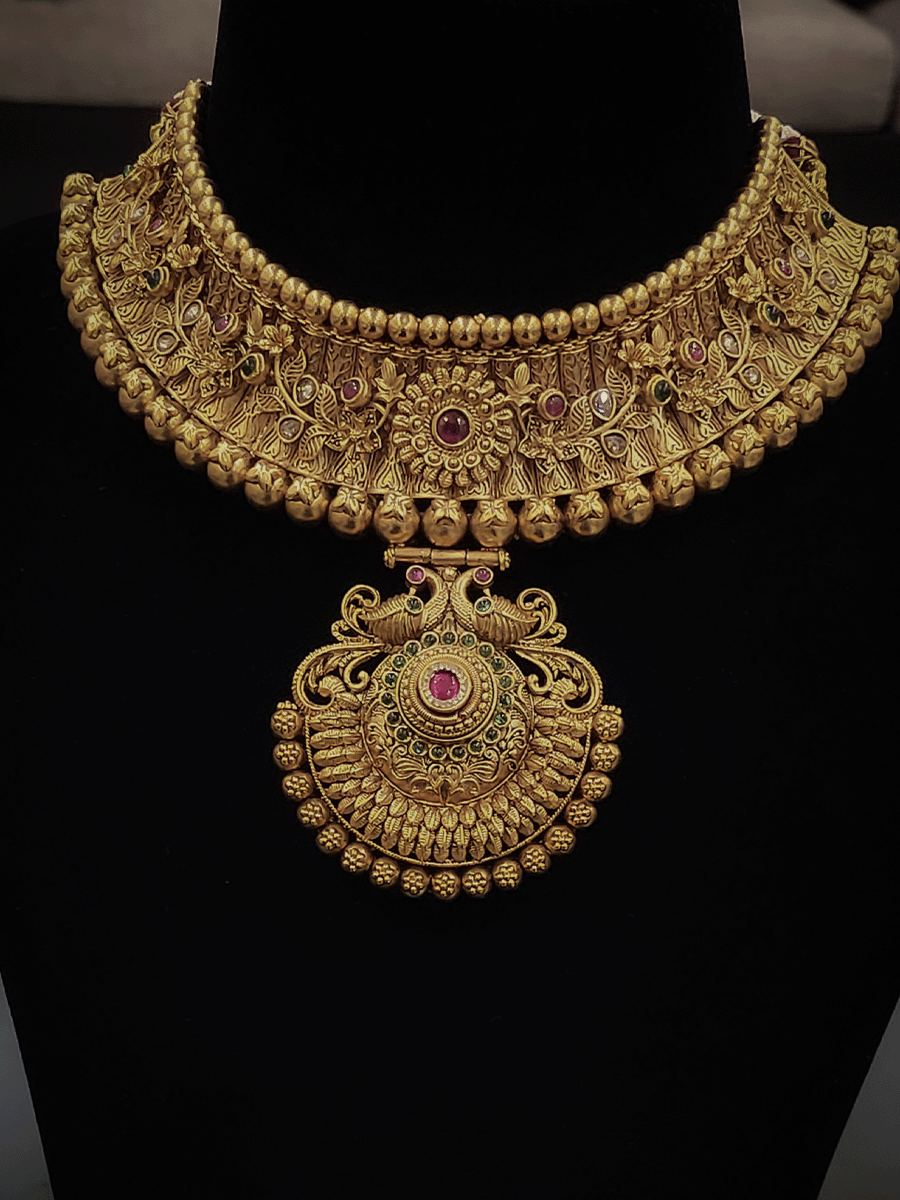 Gold bead lace 4cm broad choker with 5 cm long peacock design tukdi set with earrings and maangtika