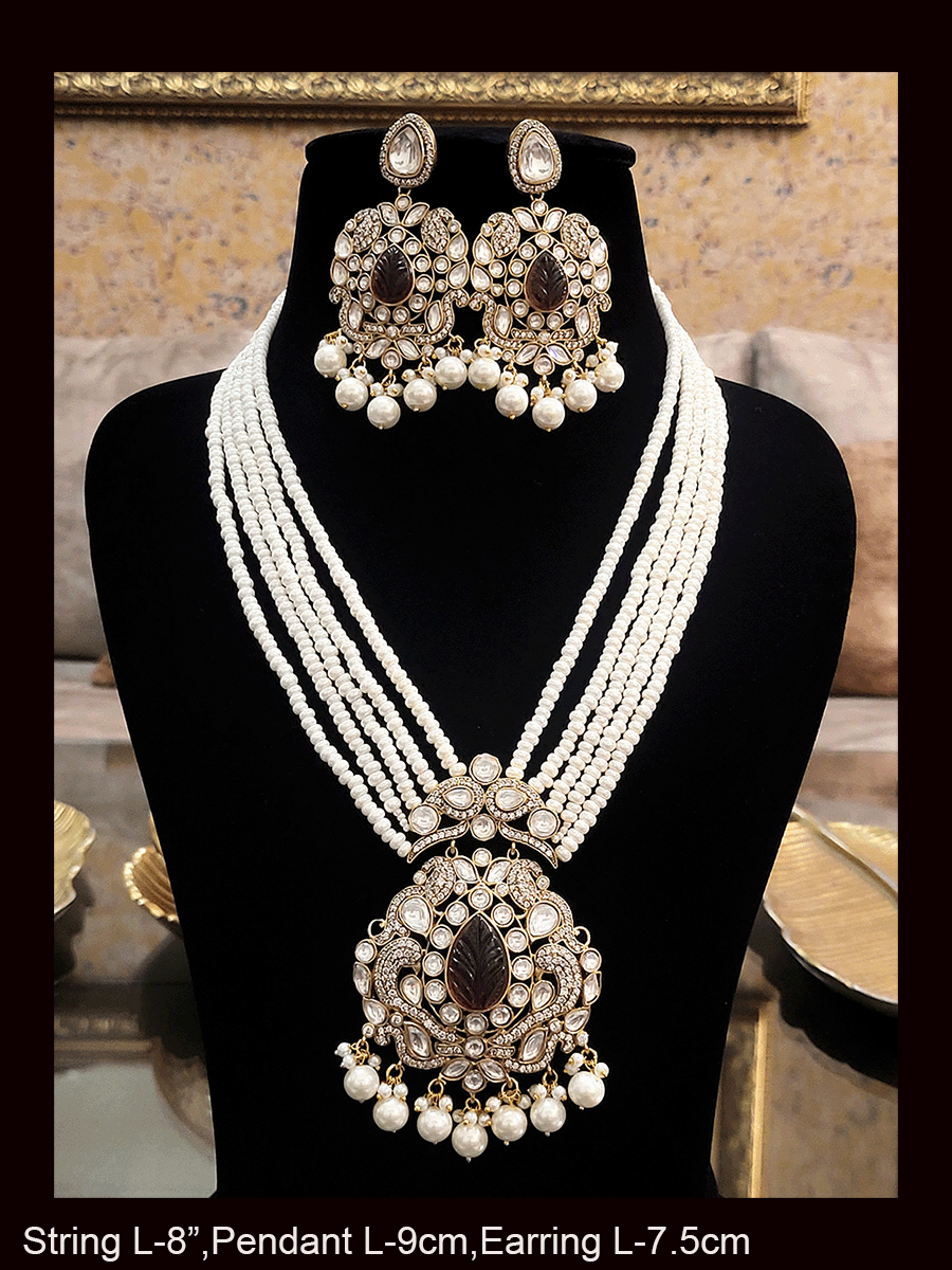 Five pearl strings kundan and AD studded set with tear drop shaped stone in the center