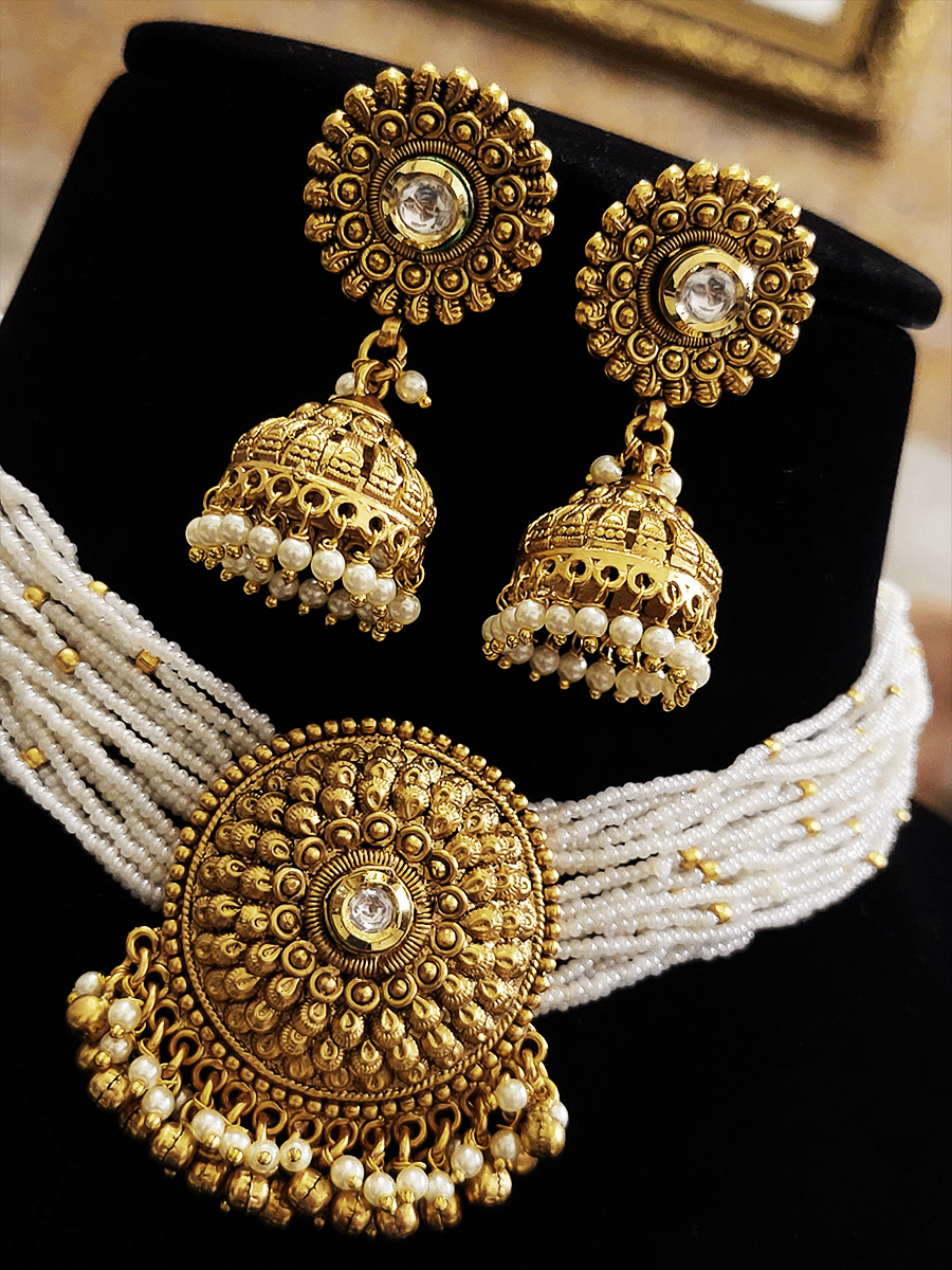 Kundan center circular tukdi side cheed strings set