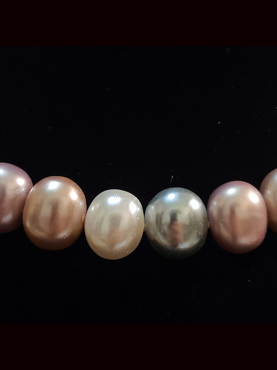 1.75 cm egg shell bead 8 inch long string