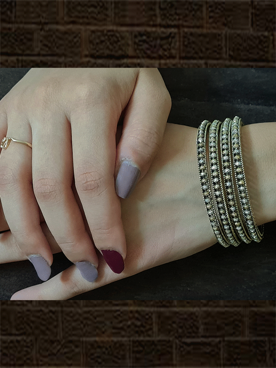 Oxidised dual tone small flower design bangles(set of four) - Odara Jewellery