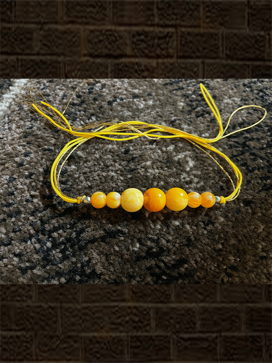 Shaded 8 yellow beads rakhi with classy dori - Odara Jewellery