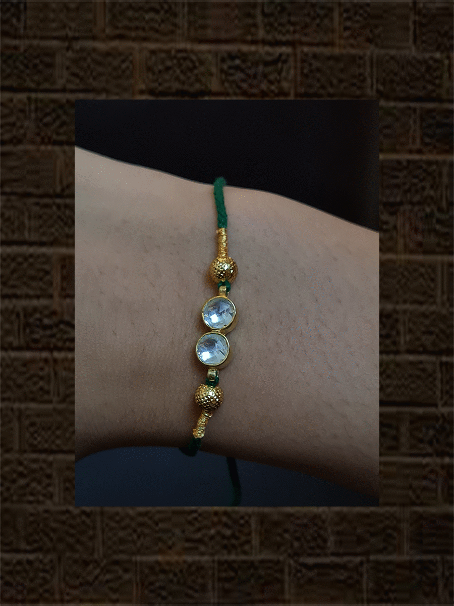 Two round kundan with side gold bead rakhi - Odara Jewellery