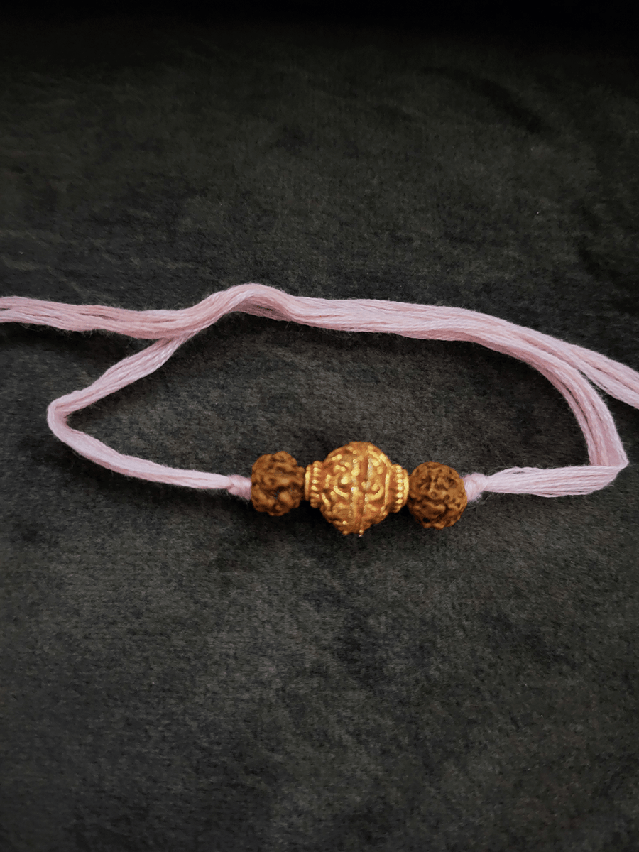 Rudraksh and geru bead rakhi - Odara Jewellery