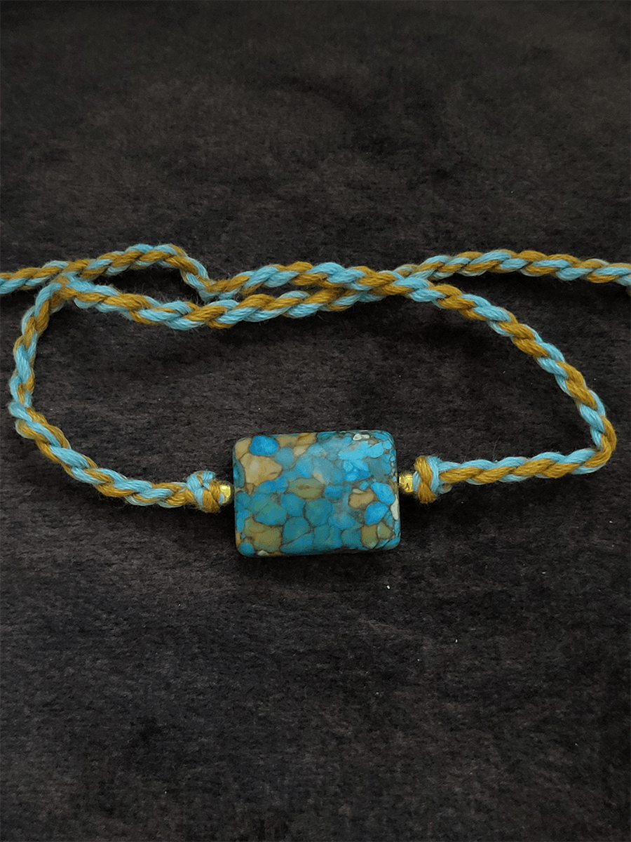 Ferozi and brown rectangular bead rakhi - Odara Jewellery